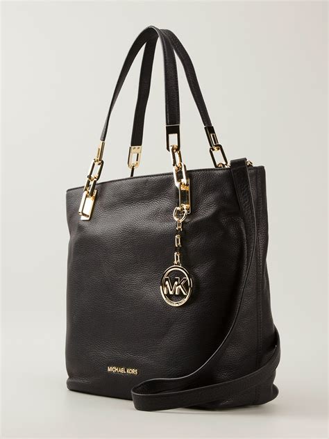 michael kors black logo handbag|michael kors original bag.